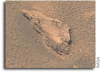 NASA’s Mars Exploration Rover Opportunity Inspects Stone Ejected From Crater
