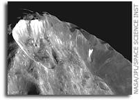 NASA Cassini Images of Phoebe’s Surface Reveals Clues to its Origin