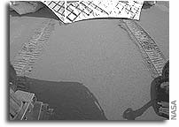 NASA Opportunity Rover Rolls onto Martian Ground