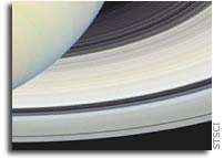 NASA’s Hubble and Cassini View Saturn From Far And Near