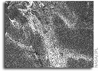 NASA Cassini Radar Sees Bright Flow-like Features Across the Surface of Titan