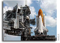 NASA’s Space Shuttle Discovery Successfully Rolls Back to Launch Pad