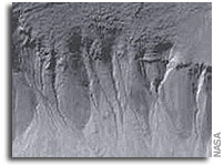 NASA scientists say liquid water formed recent gullies on Mars