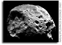 NASA Scientists Discover Pluto Kin is a Member of Saturn Family