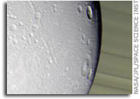 NASA’s Cassini Views Dione, a Frigid Ice World