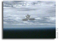 Space Shuttle Discovery Undocks From International Space Station