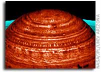 Cassini Image Shows Saturn Draped in a String of Pearls