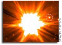 Scientists snap first images of brown dwarf in planetary system