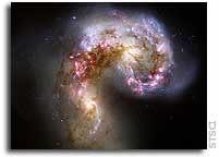NASA Hubble Image: Colliding galaxies make love, not war