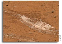 NASA Mars Rover Spirit Unearths Surprise Evidence of Wetter Past
