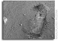 NASA Mars Phoenix Makes First Trench in Science Preserve