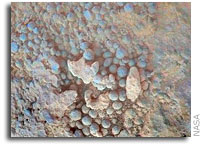 Mars Rover Examines Odd Material at Small, Young Crater