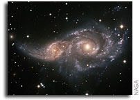 Massive Black Holes ‘Switch On’ in Galaxy Collisions