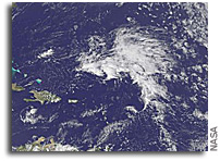 GOES-13 sees an extraordinarily early Atlantic low in the tropics