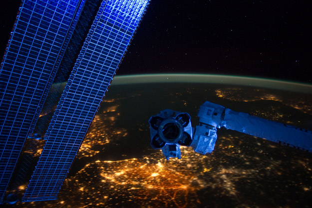 Photo: Space Station Hardware Glows During a Night Pass Over Earth