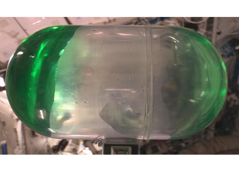 Keeping Liquids Off the Wall in Space